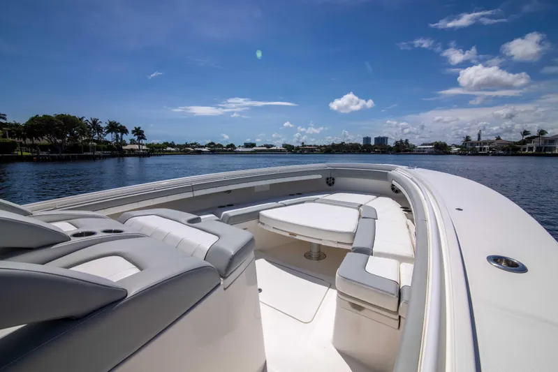 41 Regulator 2021 Yacht Photos Pics 2021 Regulator 41 boat interior with seating, on a sunny day by the water.