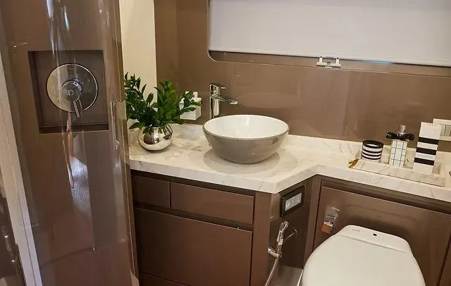  Yacht Photos Pics Luxurious Schaefer 660 yacht bathroom with modern fixtures and elegant design, 2025 model.