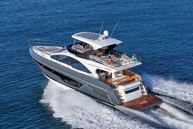  Yacht Photos Pics Luxury Schaefer 660 yacht cruising on open sea, 2025 model, sleek design, spacious deck.