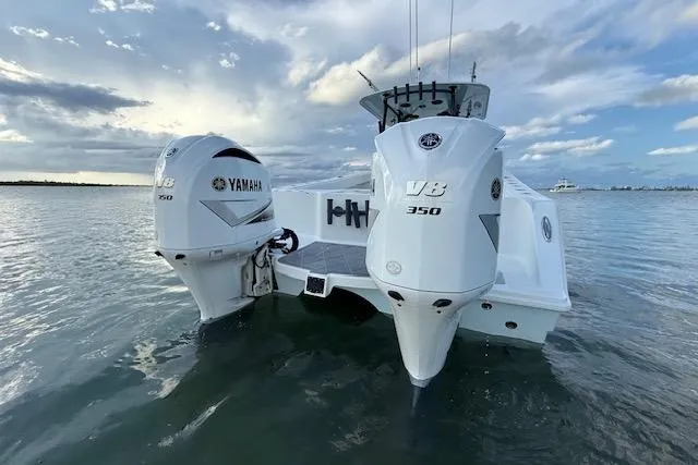  Yacht Photos Pics 2019 Freeman 34 boat with twin Yamaha V8 350 engines on calm water.