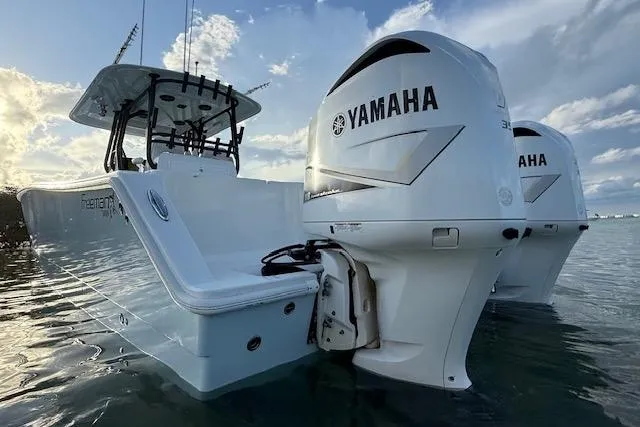  Yacht Photos Pics 2019 Freeman 34 boat with dual Yamaha engines on calm water.