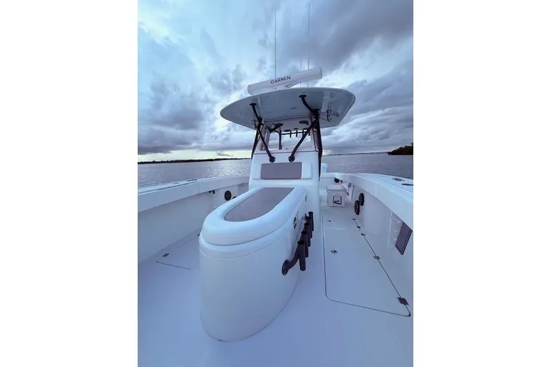  Yacht Photos Pics 2019 Freeman 34 boat on water under cloudy sky, featuring sleek design and modern equipment.