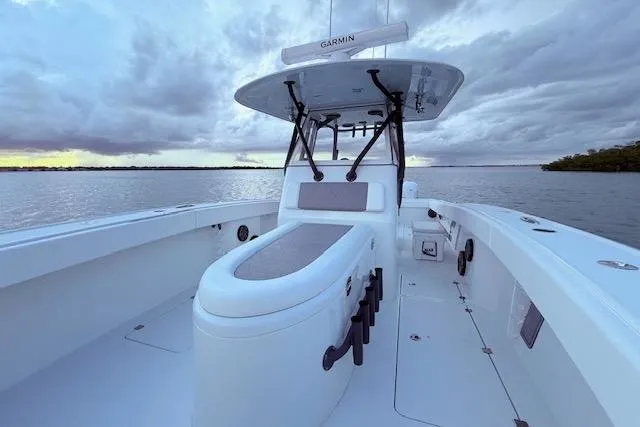  Yacht Photos Pics 2019 Freeman 34 boat on calm water under cloudy sky.