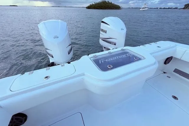  Yacht Photos Pics 2019 Freeman 34 boat with Yamaha engines on calm water.