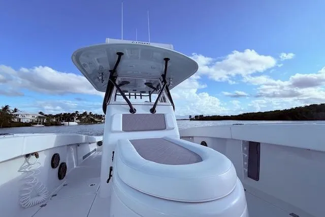  Yacht Photos Pics 2019 Freeman 34 boat with sleek design, spacious deck, and clear blue sky backdrop.