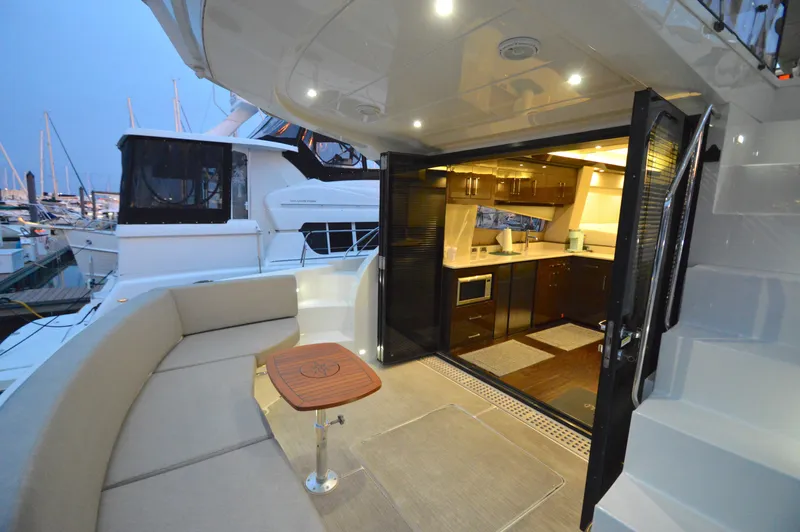 Play Craft Yacht Photos Pics Luxurious 2018 Carver C52 Flybridge yacht with elegant interior and spacious deck area.