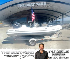 2006 Caribe Inflatables Dingy at The Boat Yard, Marrero, Louisiana, with American flag.