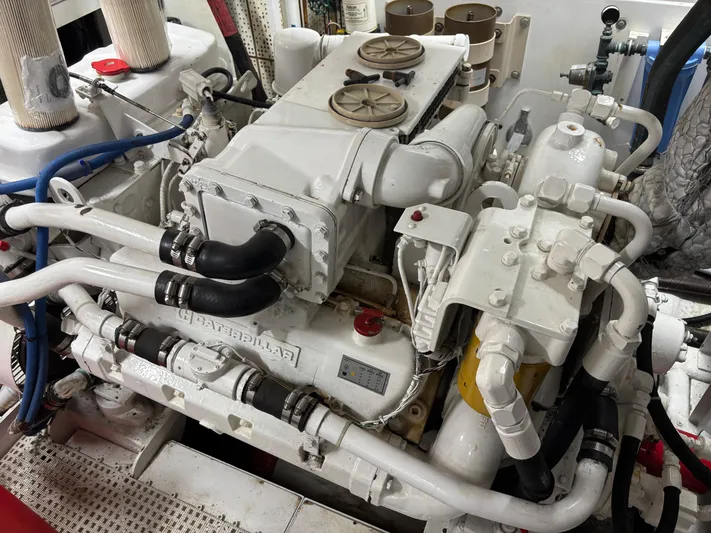  Yacht Photos Pics Engine room of 1987 DeFever 53 POC yacht, featuring a Caterpillar engine.