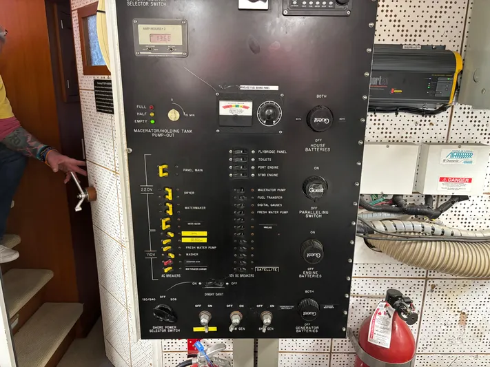  Yacht Photos Pics Control panel inside a 1987 DeFever 53 POC yacht, featuring various switches and gauges.