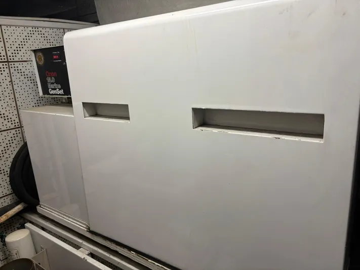  Yacht Photos Pics Engine room of 1987 DeFever 53 POC yacht with generator.