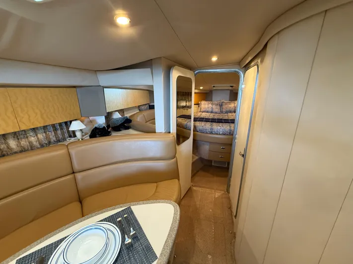 Formula 41pc Yacht Photos Pics 1999 Formula 41 PC yacht interior with cozy seating and elegant dining area.