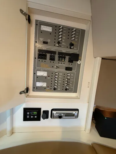 Formula 41pc Yacht Photos Pics Electrical control panel inside a 1999 Formula 41 PC boat cabin.