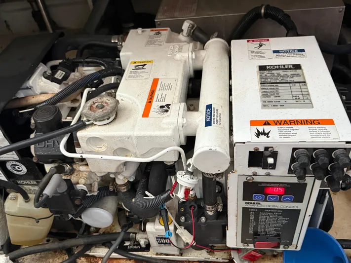 Formula 41pc Yacht Photos Pics Engine compartment of a 1999 Formula 41 PC boat with Kohler generator.