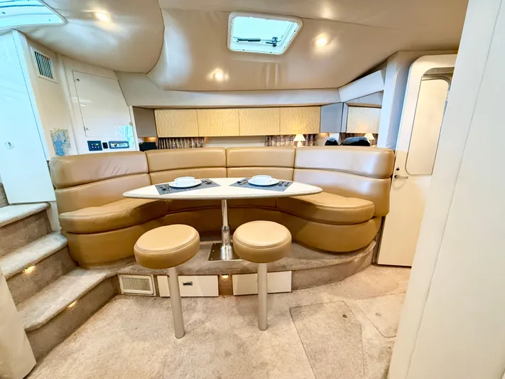 Formula 41pc Yacht Photos Pics Luxurious 1999 Formula 41 PC yacht interior with leather seating and dining area.