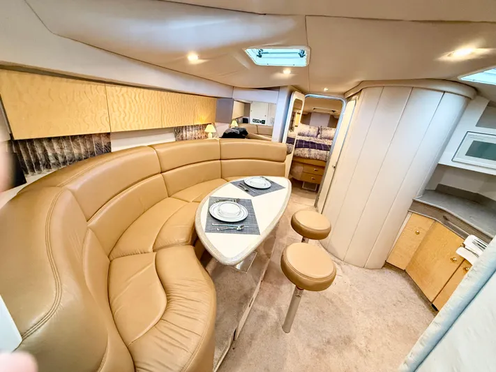 Formula 41pc Yacht Photos Pics 1999 Formula 41 PC yacht interior with leather seating, dining area, and modern amenities.