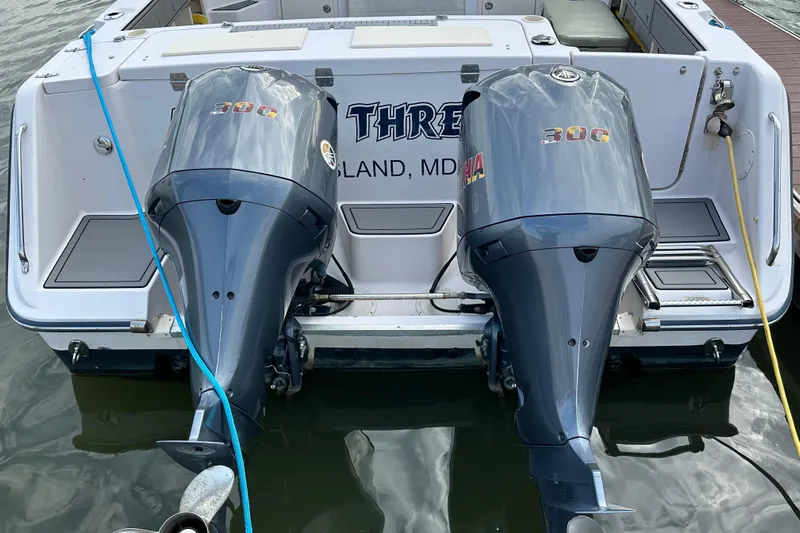 Triple Threat Yacht Photos Pics 2008 Grady-White Express 330 boat with twin Yamaha 300 engines docked in Maryland.