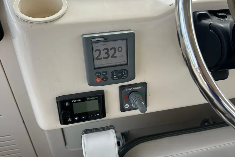 Triple Threat Yacht Photos Pics 2008 Grady-White Express 330 dashboard with navigation and control systems.