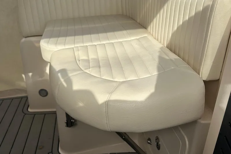 Triple Threat Yacht Photos Pics 2008 Grady-White Express 330 boat seat with white upholstery and sleek design.