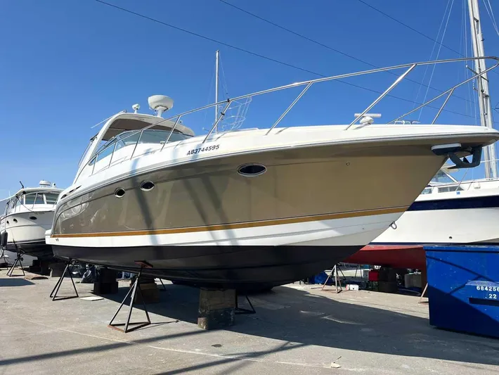  Yacht Photos Pics 2003 Formula 37 PC yacht on dry dock under clear blue sky.