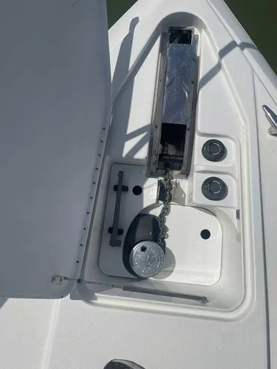  Yacht Photos Pics Anchor compartment of a 2003 Formula 37 PC boat, featuring chain and winch.