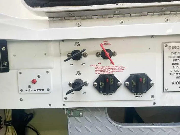  Yacht Photos Pics Control panel of a 2003 Formula 37 PC boat with switches and indicators.