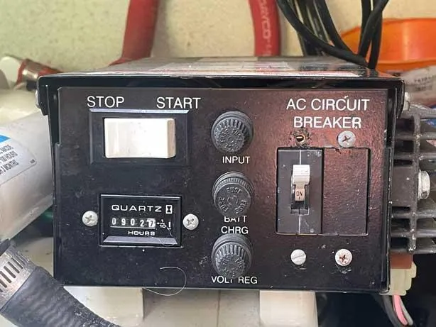  Yacht Photos Pics Control panel with AC circuit breaker and hour meter on a 2003 Formula 37 PC.