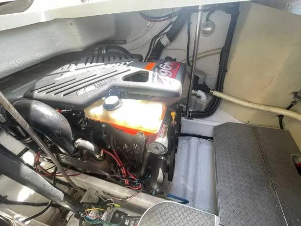  Yacht Photos Pics Engine compartment of a 2003 Formula 37 PC boat, showcasing mechanical components and wiring.