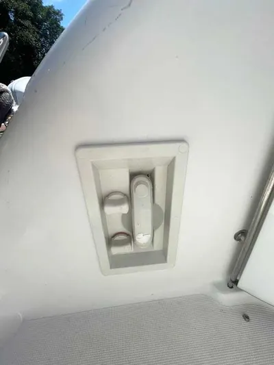  Yacht Photos Pics Control panel on a 2003 Formula 37 PC boat, featuring a white recessed design.