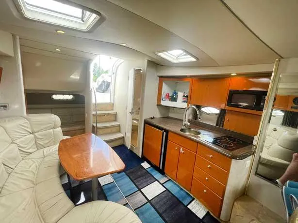  Yacht Photos Pics 2003 Formula 37 PC yacht interior with kitchen, dining area, and modern amenities.