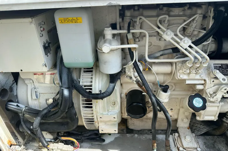 Nice Aft Too Yacht Photos Pics Engine compartment of a 2018 Leopard 45, showcasing mechanical components and wiring.