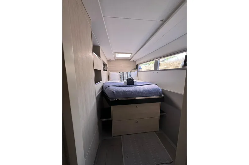 Nice Aft Too Yacht Photos Pics Cozy bedroom interior of 2018 Leopard 45 yacht with modern design and natural light.