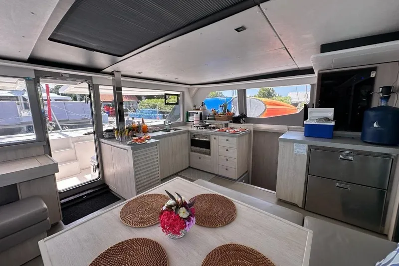 Nice Aft Too Yacht Photos Pics Interior of 2018 Leopard 45 catamaran featuring modern kitchen and dining area.