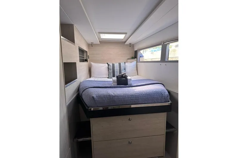 Nice Aft Too Yacht Photos Pics Cozy bedroom interior of 2018 Leopard 45 yacht with skylight and modern design.