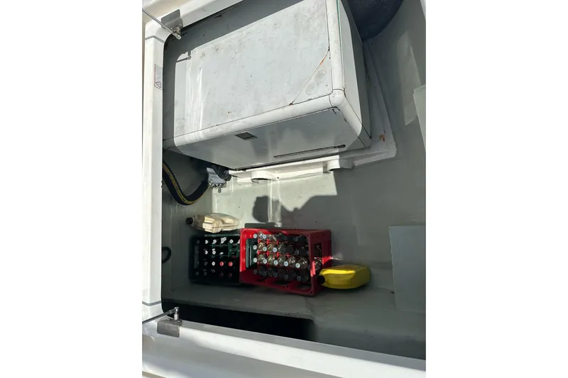 Nice Aft Too Yacht Photos Pics Storage compartment in a 2018 Leopard 45 boat with crates and equipment.
