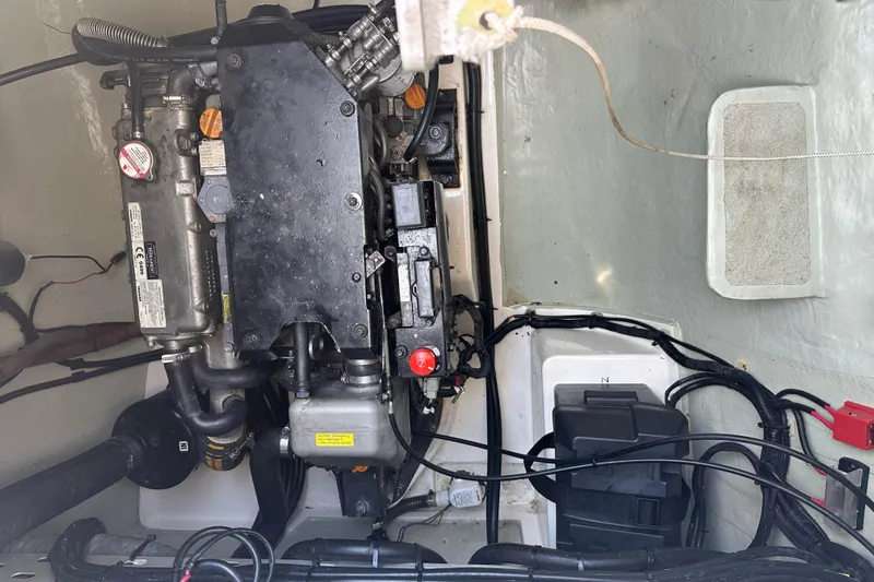 Nice Aft Too Yacht Photos Pics Engine compartment of a 2018 Leopard 45 catamaran, showcasing mechanical components and wiring.
