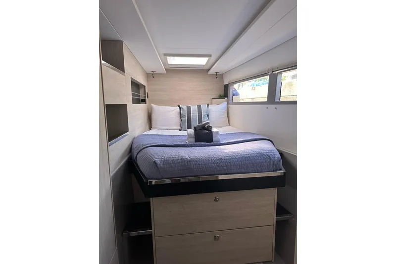 Nice Aft Too Yacht Photos Pics Luxurious cabin interior of 2018 Leopard 45 yacht with cozy bed and modern design.