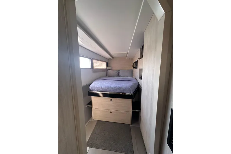Nice Aft Too Yacht Photos Pics Interior cabin of 2018 Leopard 45 catamaran with cozy bed and modern design.