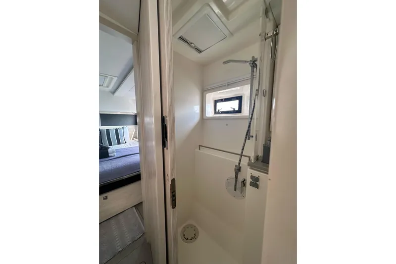 Nice Aft Too Yacht Photos Pics Interior of 2018 Leopard 45 yacht showing shower and bedroom area.