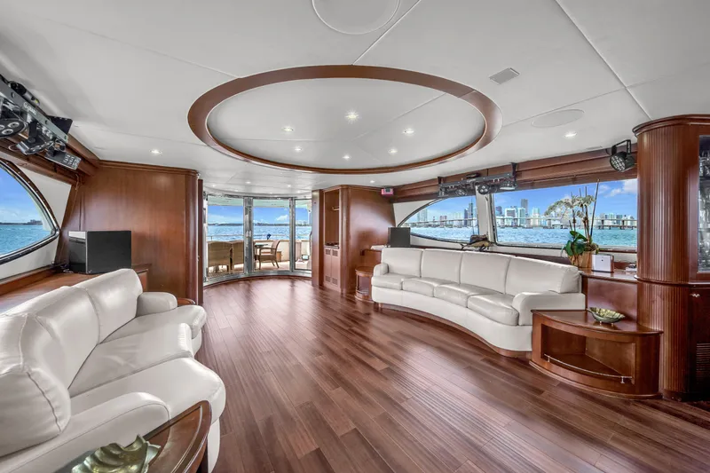  Yacht Photos Pics Luxurious interior of 2006 Azimut 100 Jumbo yacht with panoramic windows and elegant furnishings.