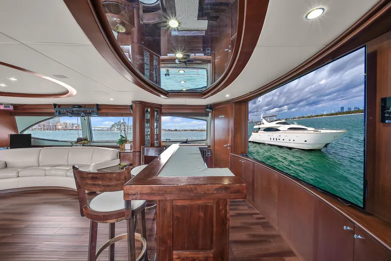  Yacht Photos Pics Luxurious interior of 2006 Azimut 100 Jumbo yacht with modern amenities and elegant design.