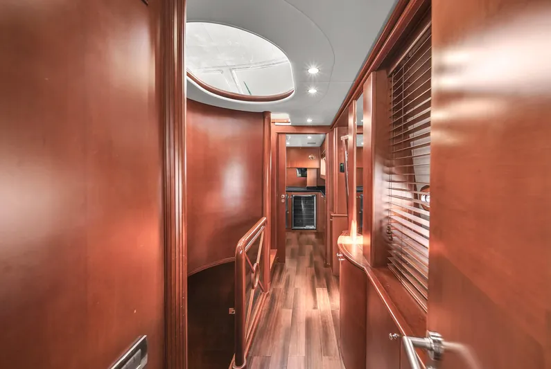  Yacht Photos Pics Interior hallway of 2006 Azimut 100 Jumbo yacht with wooden finishes.