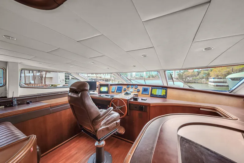  Yacht Photos Pics Luxurious helm station of 2006 Azimut 100 Jumbo yacht with advanced navigation systems.