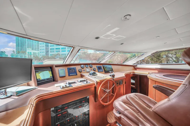  Yacht Photos Pics Luxurious helm of 2006 Azimut 100 Jumbo yacht with modern navigation equipment.