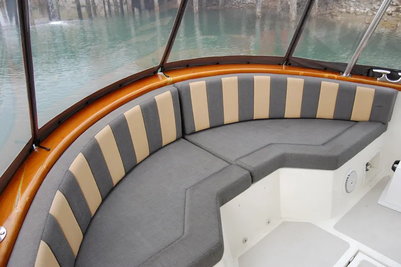  Yacht Photos Pics 1981 Willard Marine Pilot House Trawler interior with cushioned seating and water view.