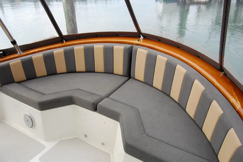  Yacht Photos Pics 1981 Willard Marine Pilot House Trawler with cushioned seating in the cabin.