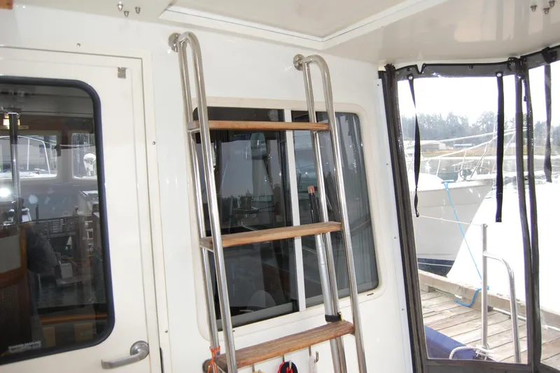  Yacht Photos Pics 1981 Willard Marine Pilot House Trawler interior with ladder and window view.