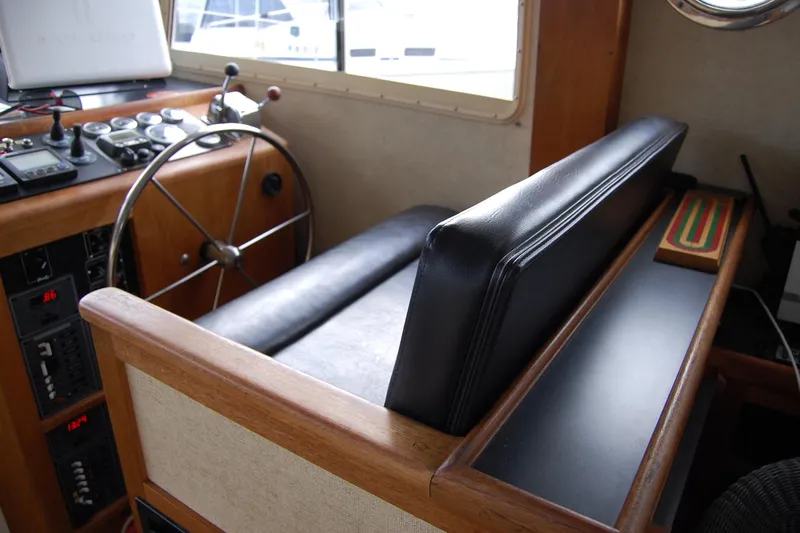  Yacht Photos Pics 1981 Willard Marine Pilot House Trawler interior with steering wheel and control panel.