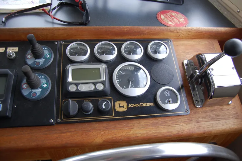  Yacht Photos Pics Control panel of a 1981 Willard Marine Pilot House Trawler with John Deere gauges.
