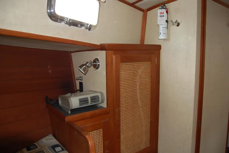  Yacht Photos Pics 1981 Willard Marine Pilot House Trawler interior with wood paneling and fire extinguisher.