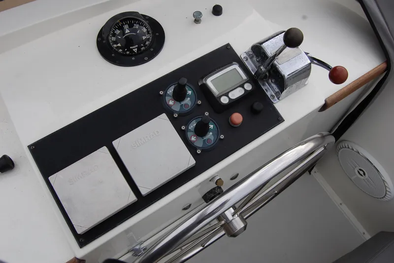  Yacht Photos Pics Control panel of a 1981 Willard Marine Pilot House Trawler with navigation instruments.